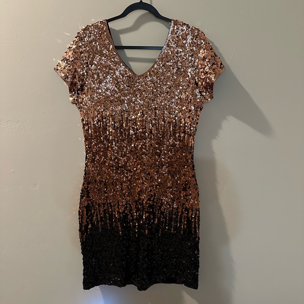 Gold and black sequin dress